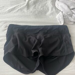 Black size 10 lululemon speed up shorts